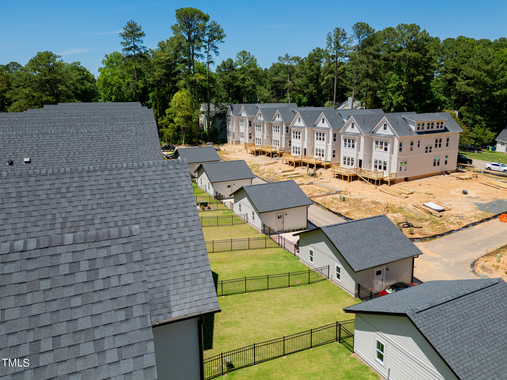 853 Athens Drive, Unit 101 Raleigh, NC 27606 - Photo 49 of 61 aerial view of a house with swimming pool and sitting area