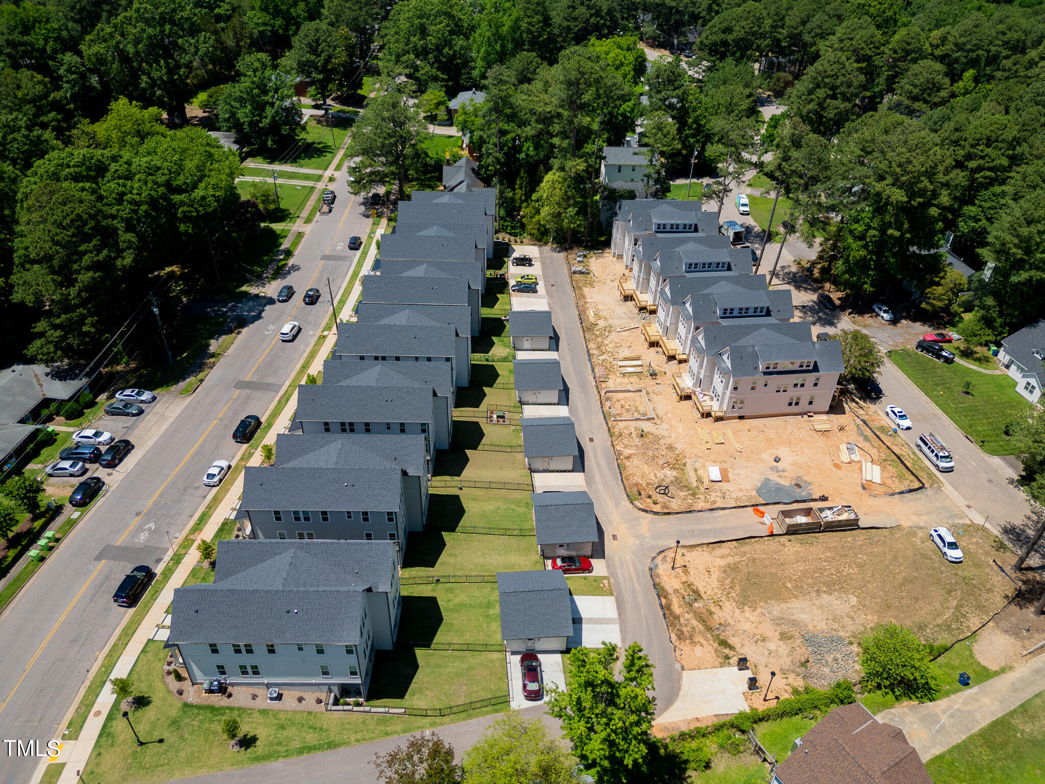 853 Athens Drive, Unit 101 Raleigh, NC 27606 - Photo 50 of 61 an aerial view of residential house with outdoor space