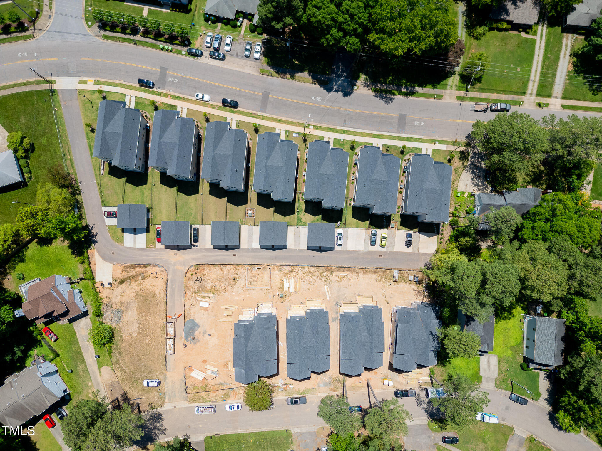853 Athens Drive, Unit 101 Raleigh, NC 27606 - Photo 52 of 61 a building with swimming pool and outdoor seating