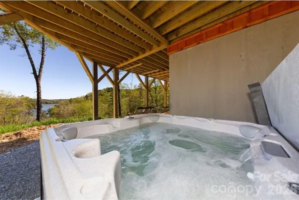 a view of swimming pool with a yard