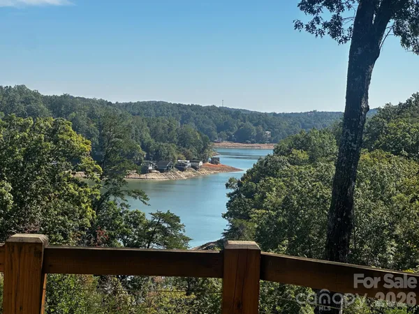 a view of a lake from a balcony