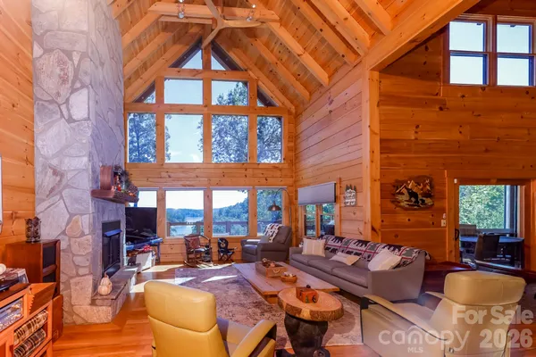 a view of a patio with couches chairs and potted plants