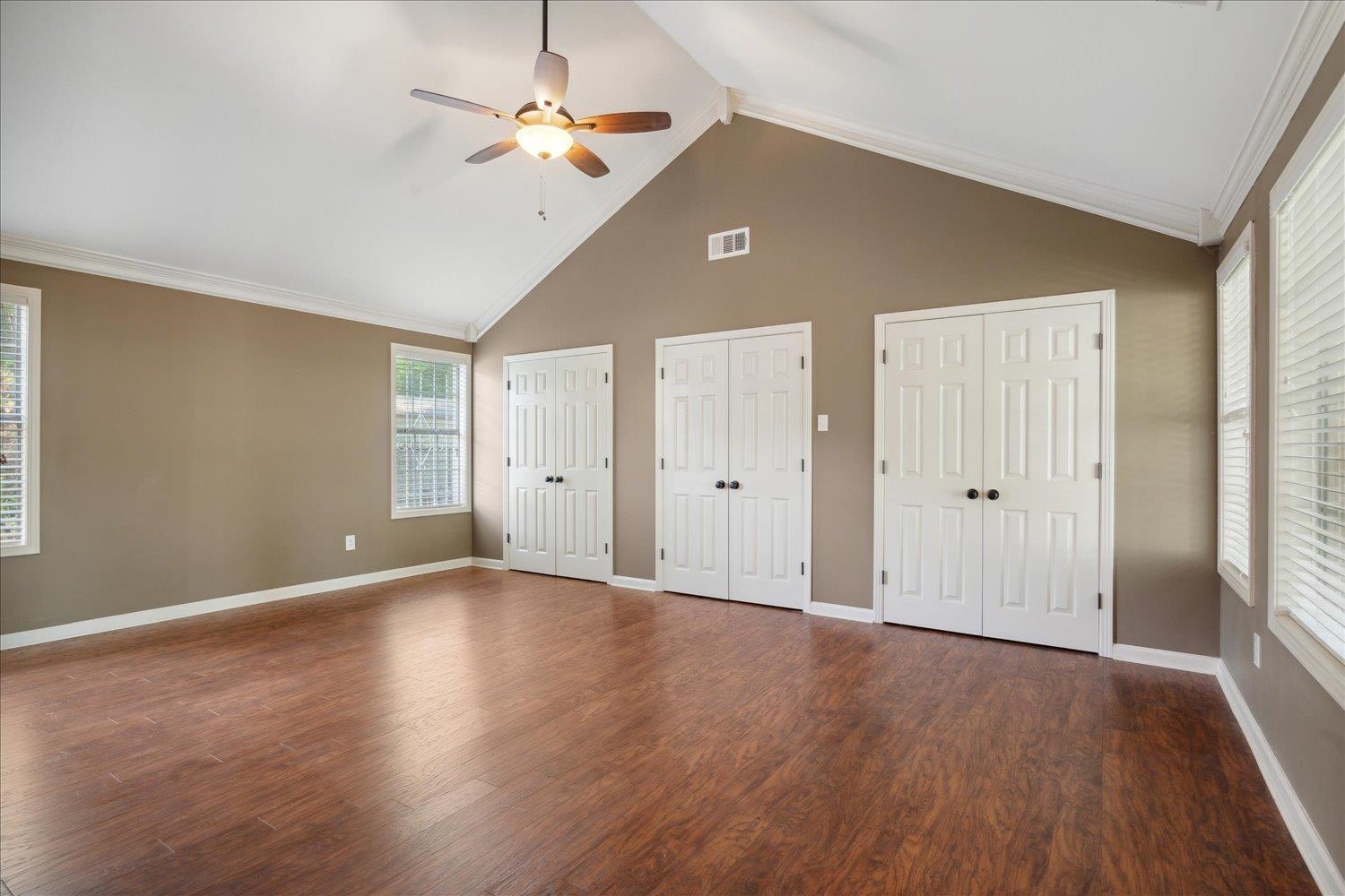 964 Ivy Road Memphis, TN 38117 - Photo 15 of 33 wooden floor in an empty room with a window