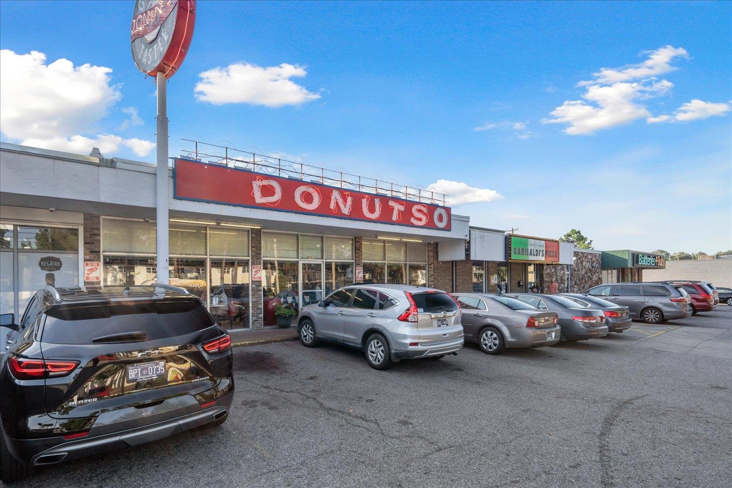 964 Ivy Road Memphis, TN 38117 - Photo 31 of 33 a car parked in front of a store