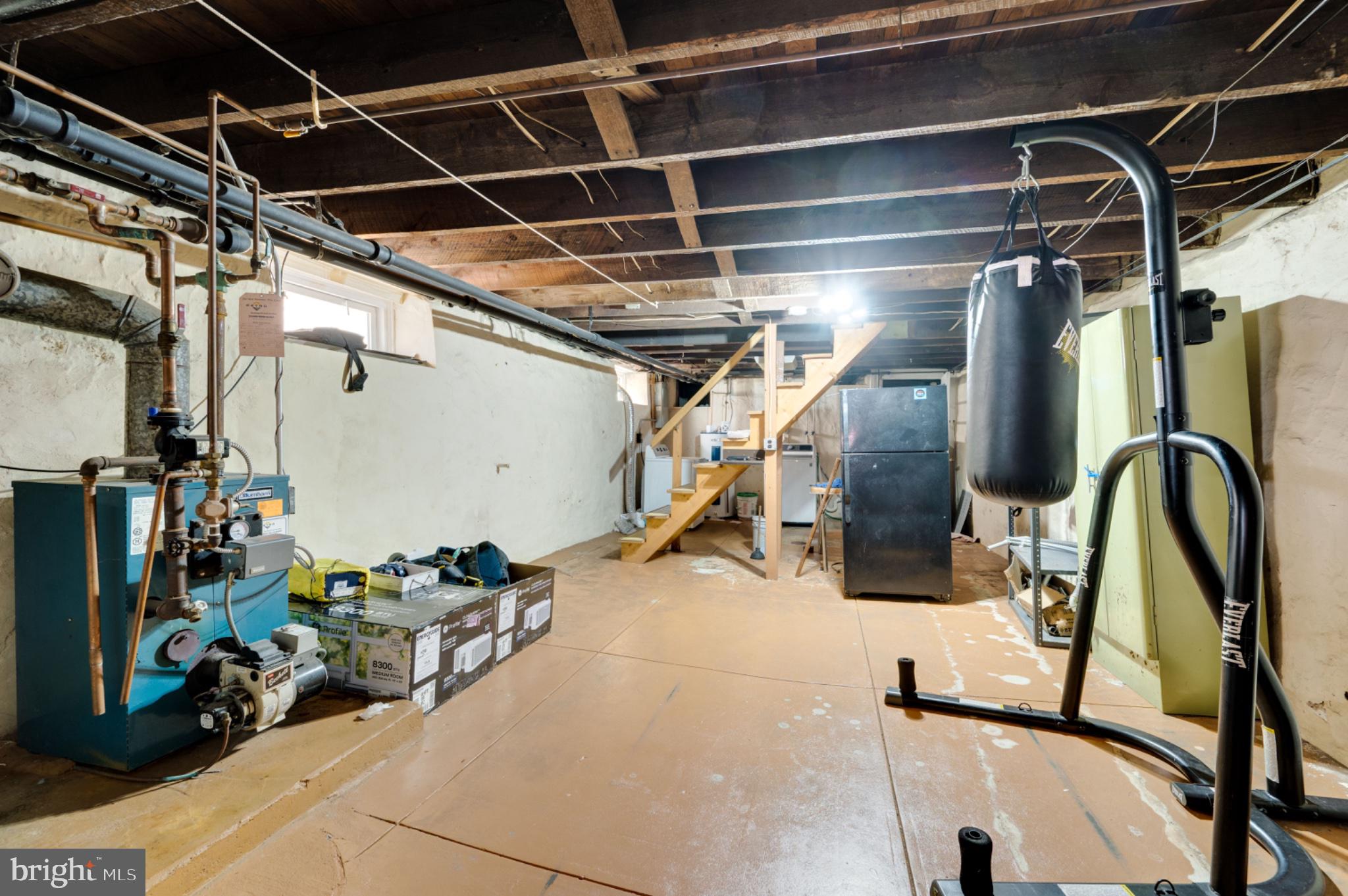 1448 Luzerne Street Reading, PA 19601 - Photo 24 of 32 Spacious basement with workout potential.