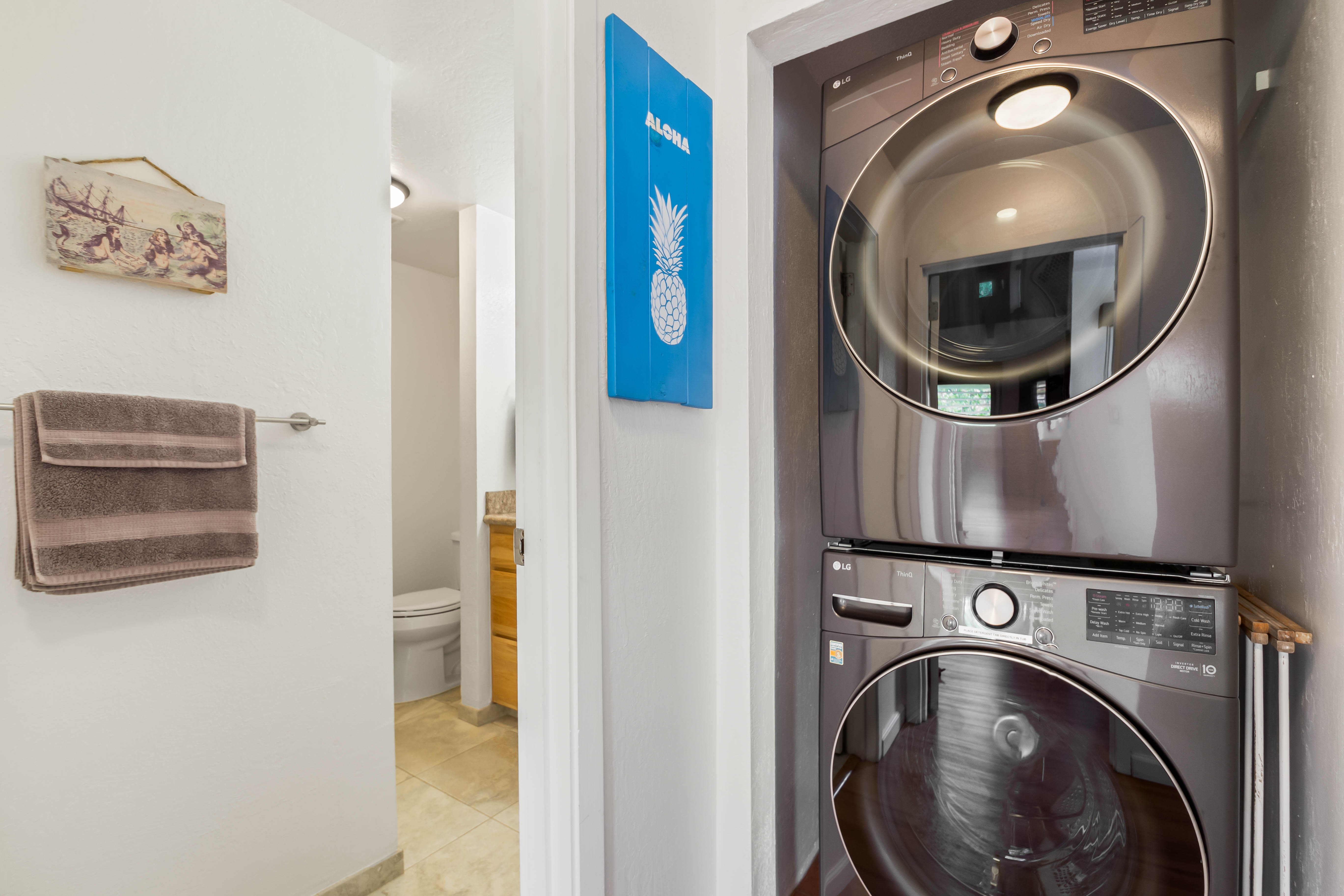 1901 Poipu Road, Unit 633 Koloa, HI 96756 - Photo 16 of 30 a view of a hallway with washer and dryer