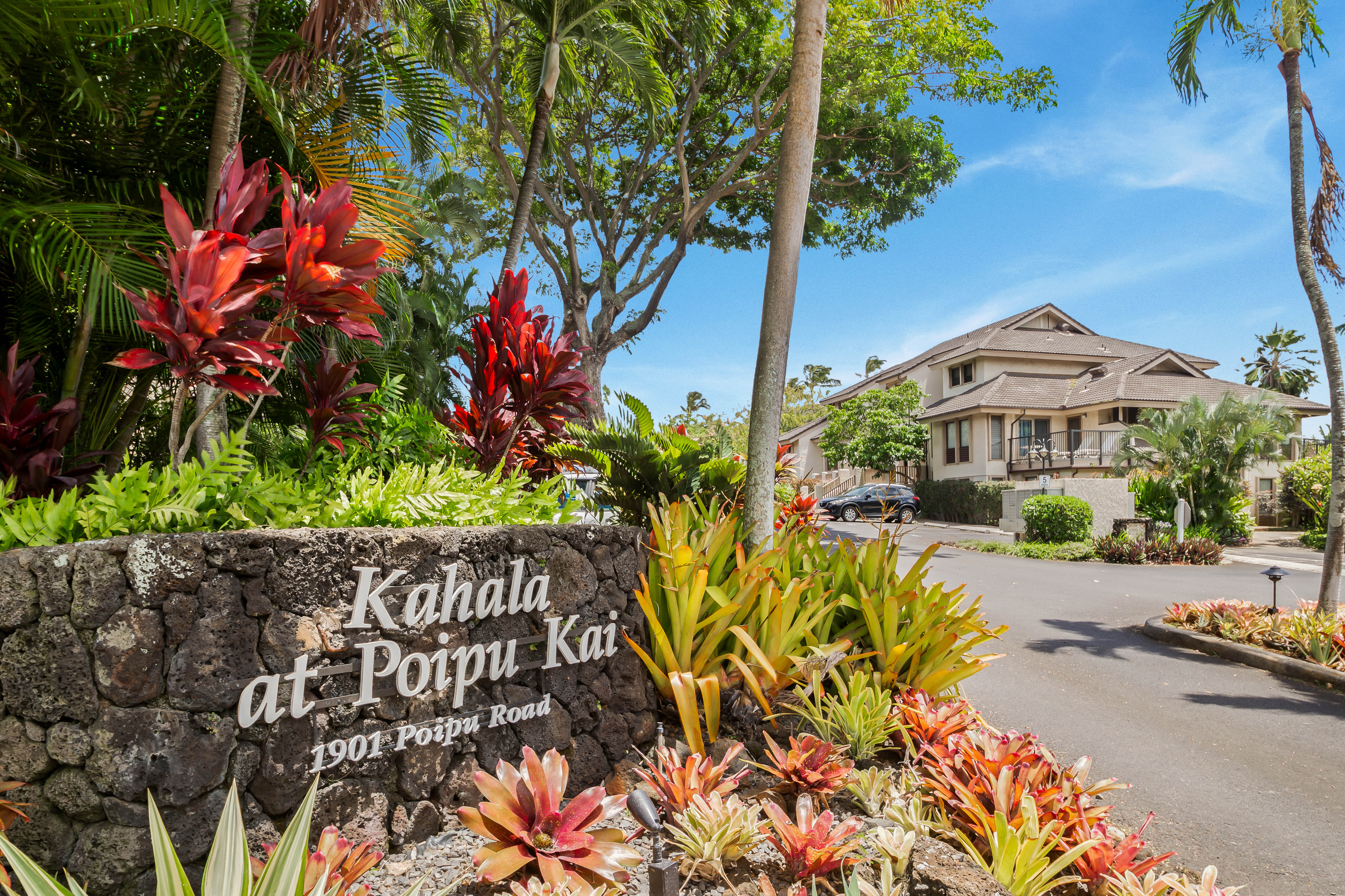 1901 Poipu Road, Unit 633 Koloa, HI 96756 - Photo 25 of 30 a front view of a house with a lot of flower garden