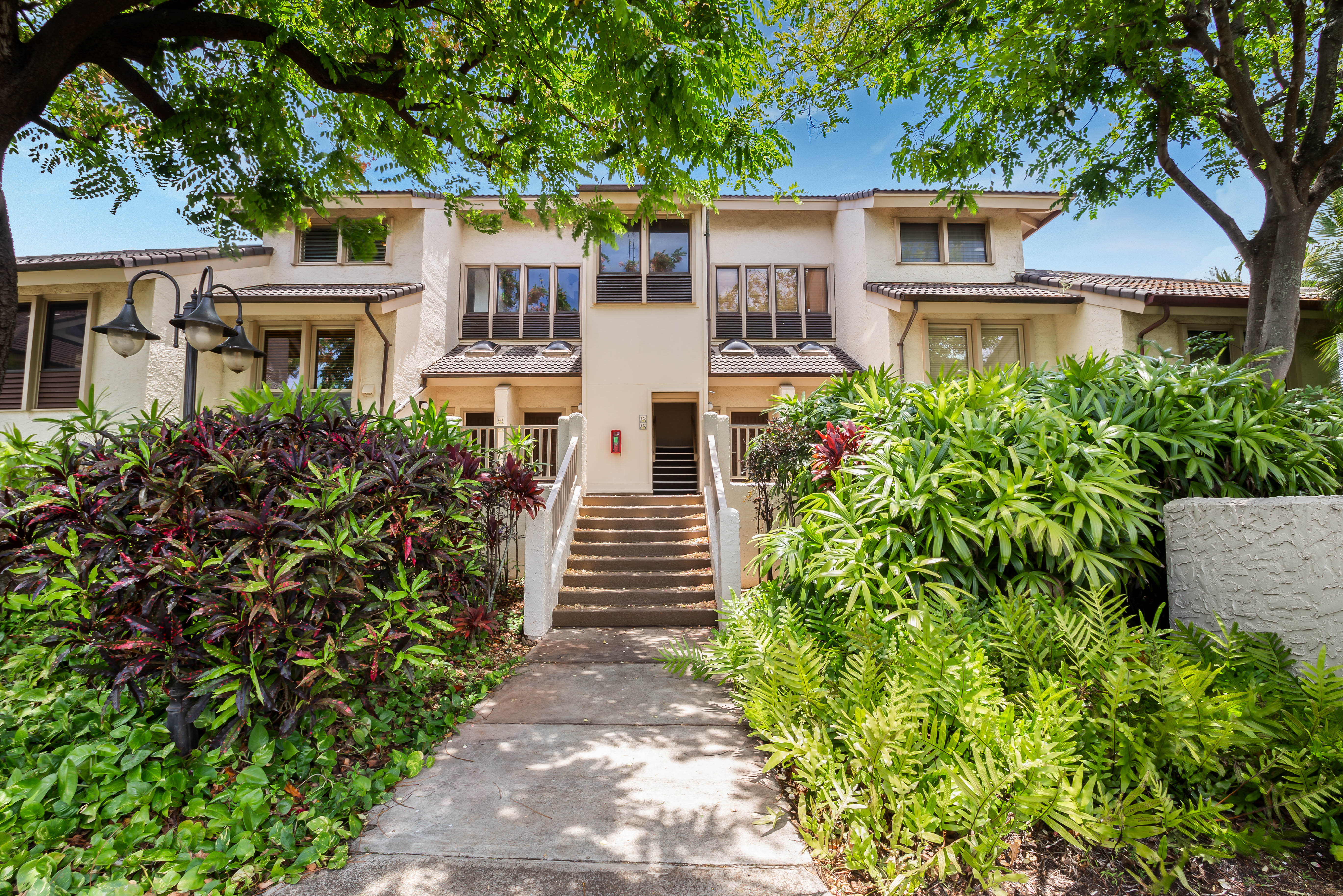1901 Poipu Road, Unit 633 Koloa, HI 96756 - Photo 4 of 30 front view of a house with a garden