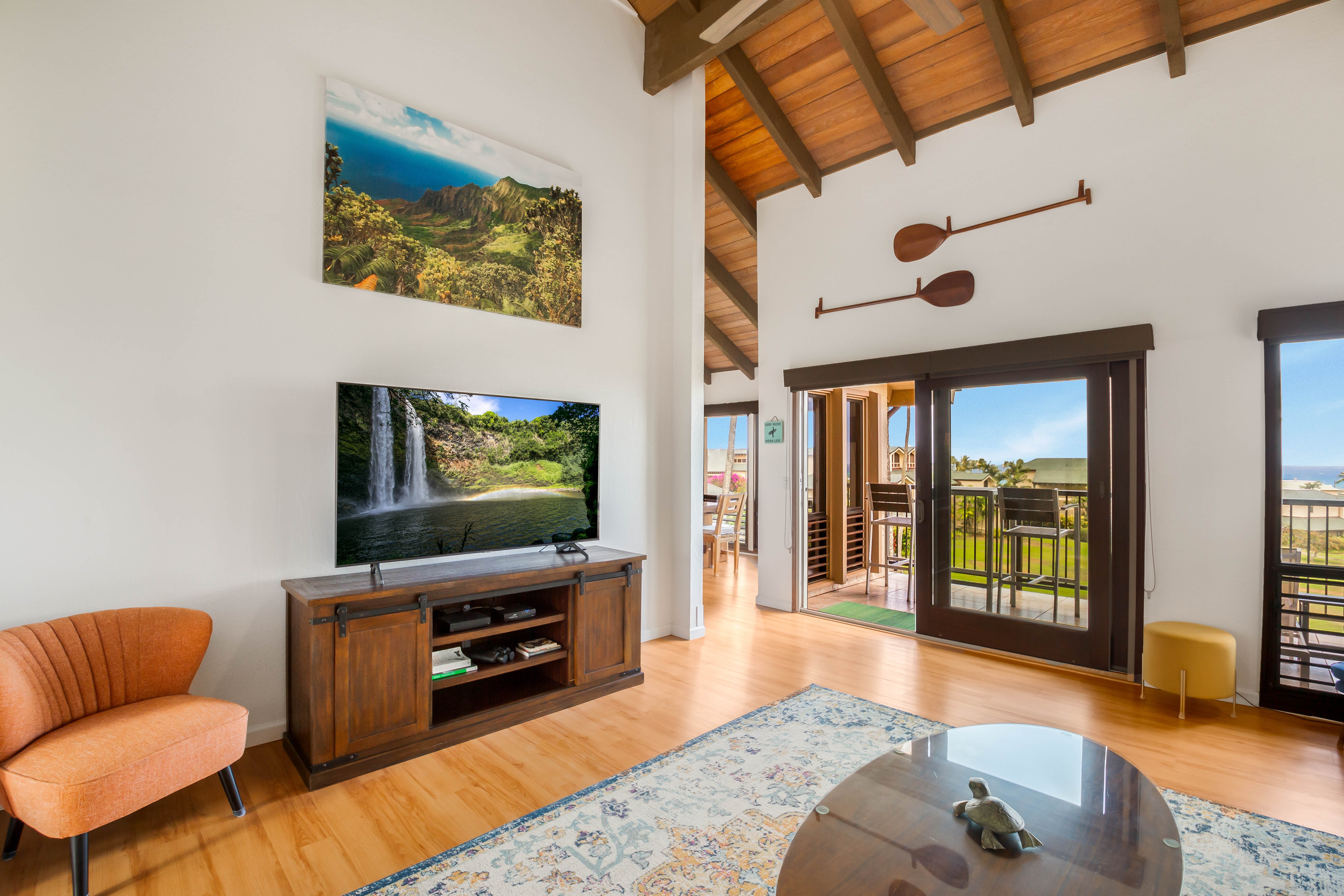 1901 Poipu Road, Unit 633 Koloa, HI 96756 - Photo 9 of 30 a living room with furniture and a flat screen tv