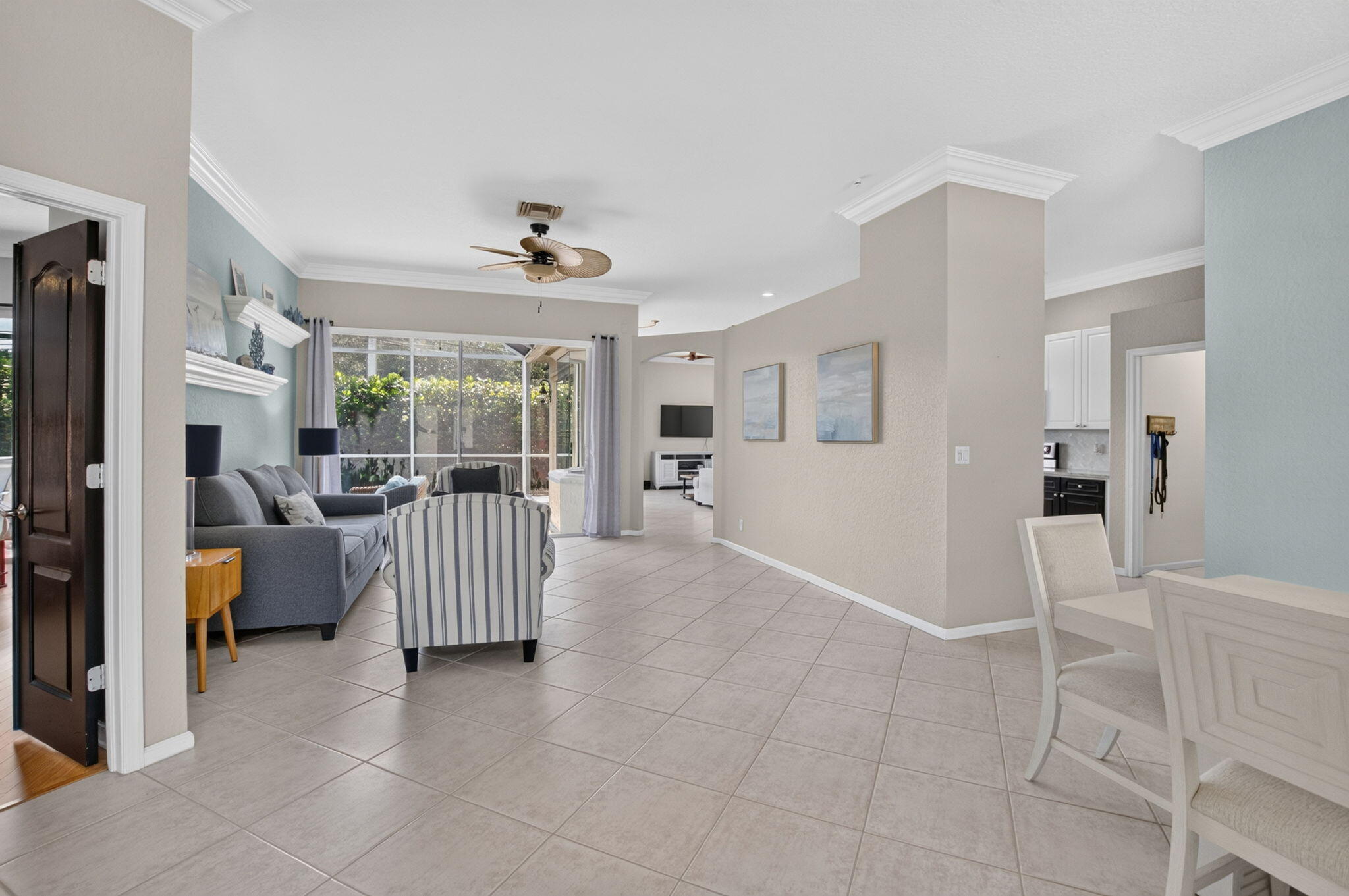 1365 East Barwick Ranch Circle Delray Beach, FL 33445 - Photo 13 of 77 a living room with furniture and a flat screen tv