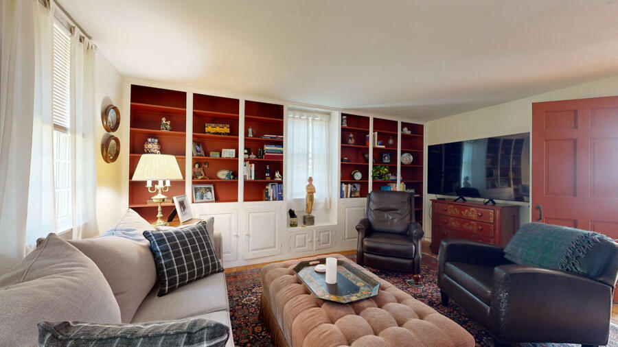 654 Pleasant Point Road Cushing, ME 04563 - Photo 36 of 81 Formal Living Room w/ Built-Ins