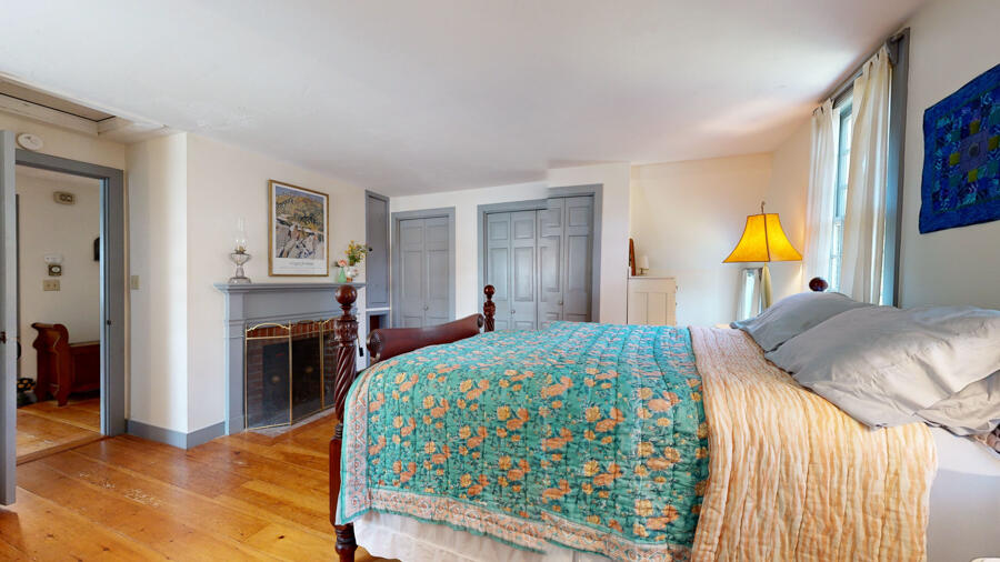 654 Pleasant Point Road Cushing, ME 04563 - Photo 46 of 81 Primary Bedroom w/ Fireplace