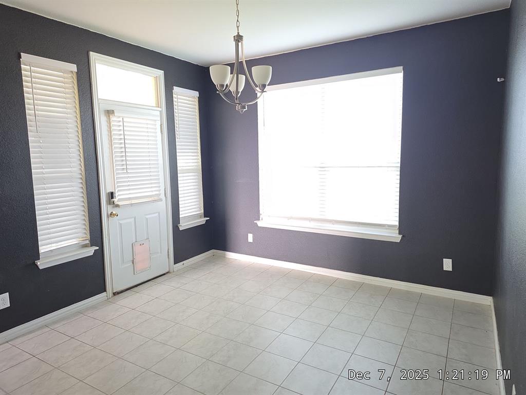 128 Spring Creek Circle Paradise, TX 76073 - Photo 15 of 21 a view of an empty room with a window