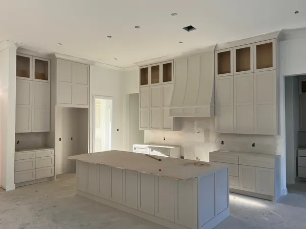 a bedroom with a bed and a cabinets