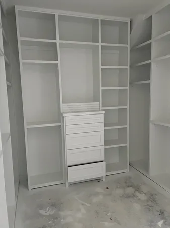 a close up of a wall with a white wall