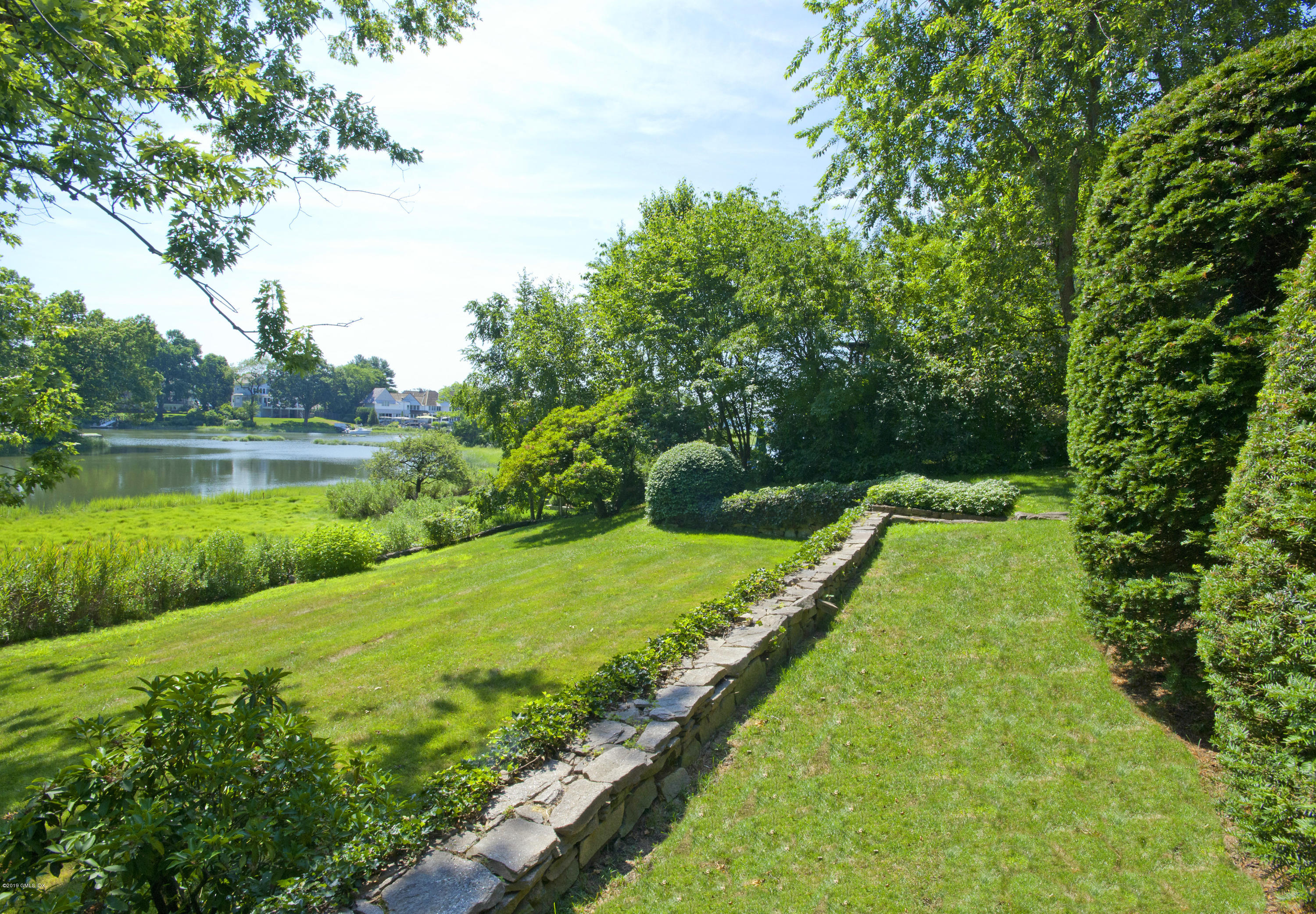 3 Perkley Lane Riverside, CT 06878 - Photo 25 of 29 a view of a yard with a large trees
