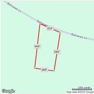 a bathroom with a shower and a wooden floor