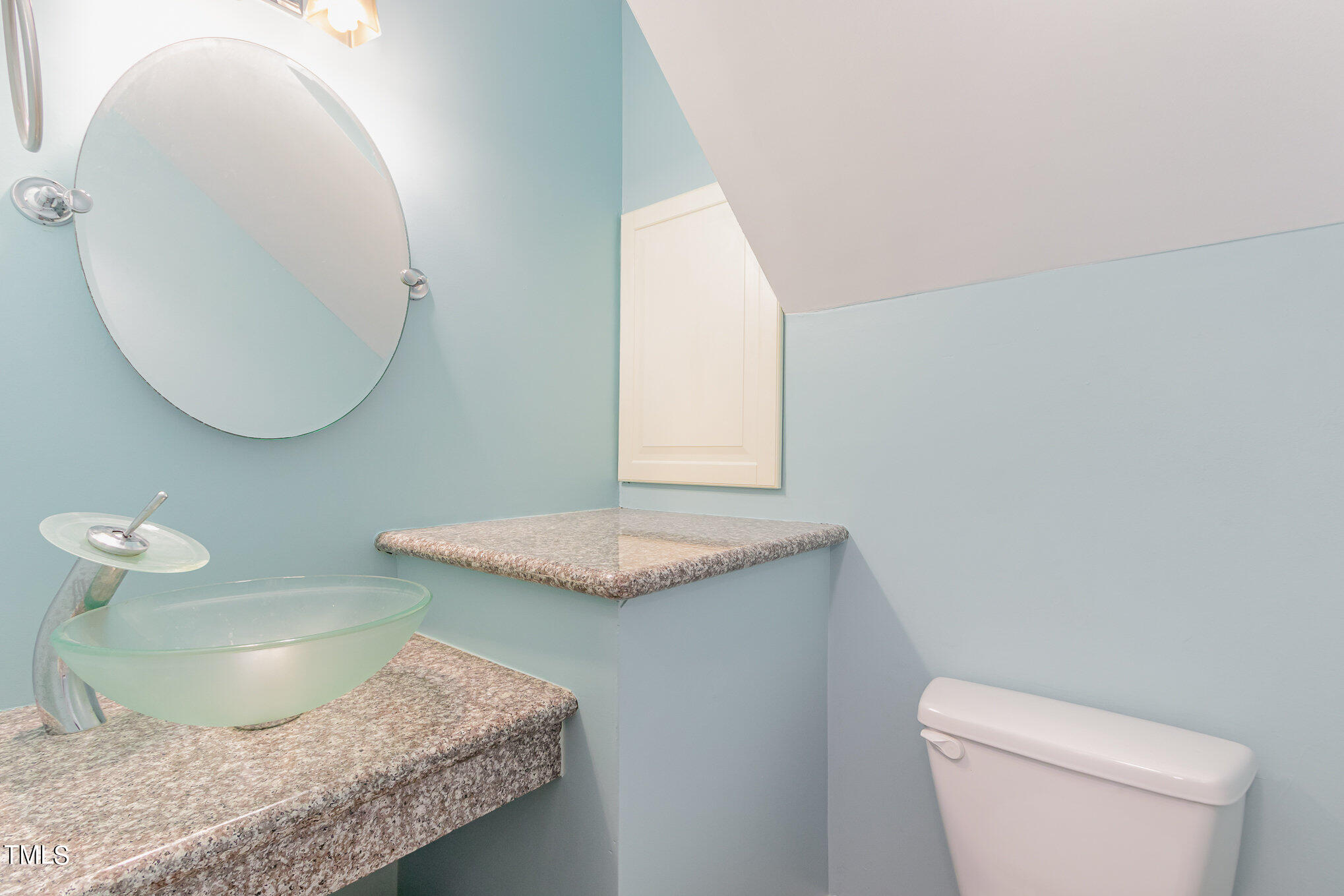 2548 Noble Road Raleigh, NC 27608 - Photo 17 of 27 a bathroom with a granite countertop sink and a mirror
