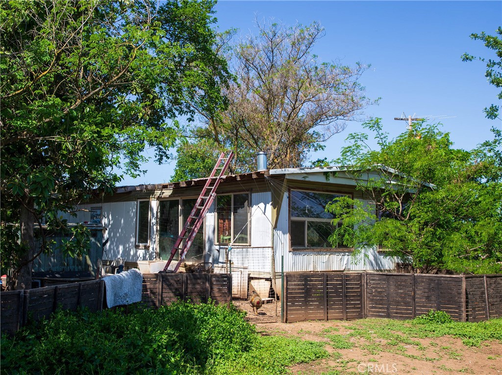 11775 State Highway Red Bluff, CA 96080 - Photo 8 of 23 front view of a house with a tree