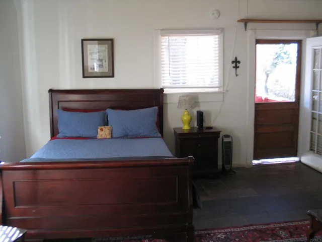 a kitchen with stainless steel appliances a refrigerator stove and microwave