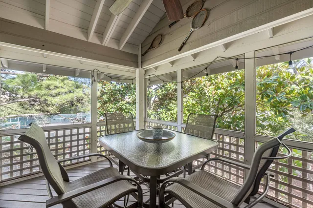 a view of a city from a dining room with large windows