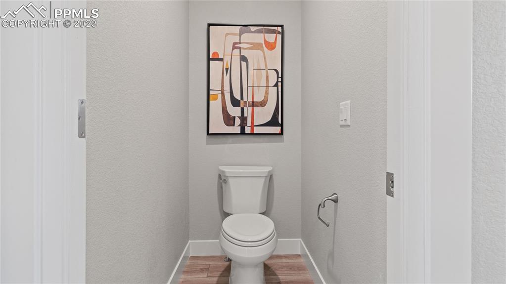 2174 Coyote Mint Drive Monument, CO 80132 - Photo 41 of 50 a white toilet sitting next to a white wall