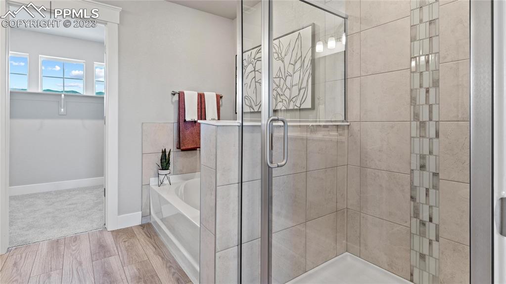 2174 Coyote Mint Drive Monument, CO 80132 - Photo 42 of 50 a bathroom with a shower