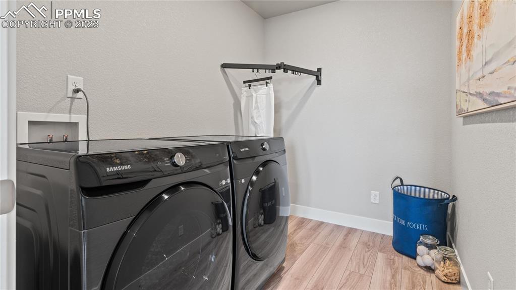 2174 Coyote Mint Drive Monument, CO 80132 - Photo 45 of 50 a utility room with dryer and washer