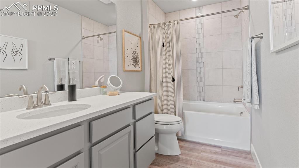 2174 Coyote Mint Drive Monument, CO 80132 - Photo 46 of 50 a bathroom with a sink a toilet and shower