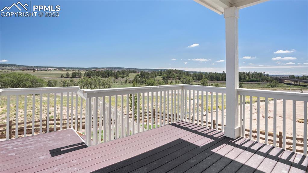 2174 Coyote Mint Drive Monument, CO 80132 - Photo 48 of 50 a view of a balcony with wooden floor