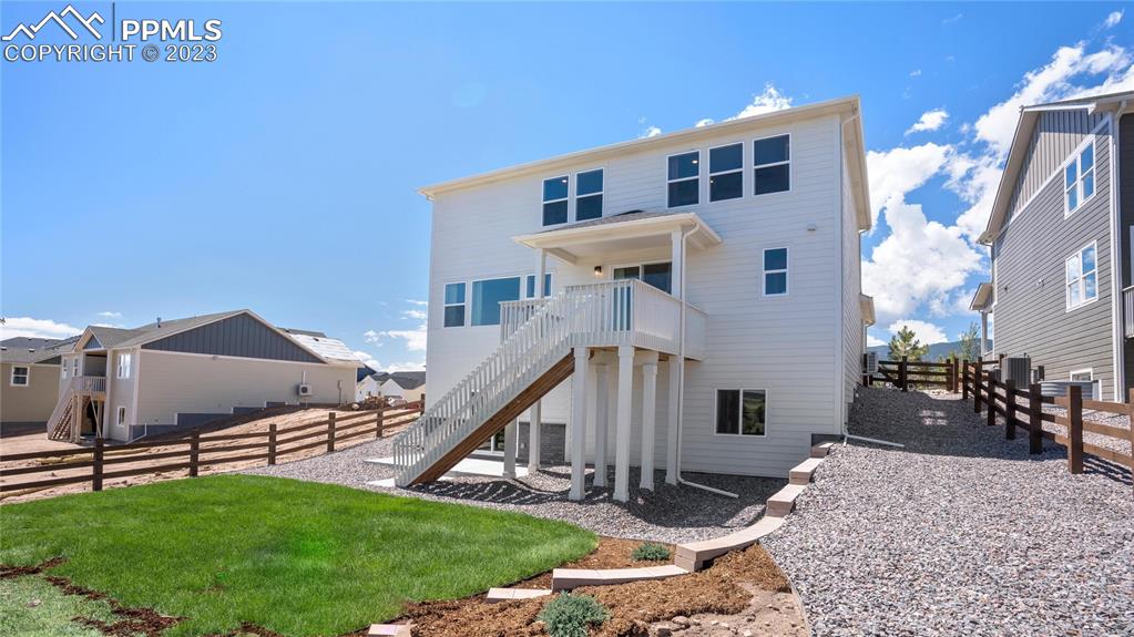 2174 Coyote Mint Drive Monument, CO 80132 - Photo 50 of 50 a view of a house with a yard
