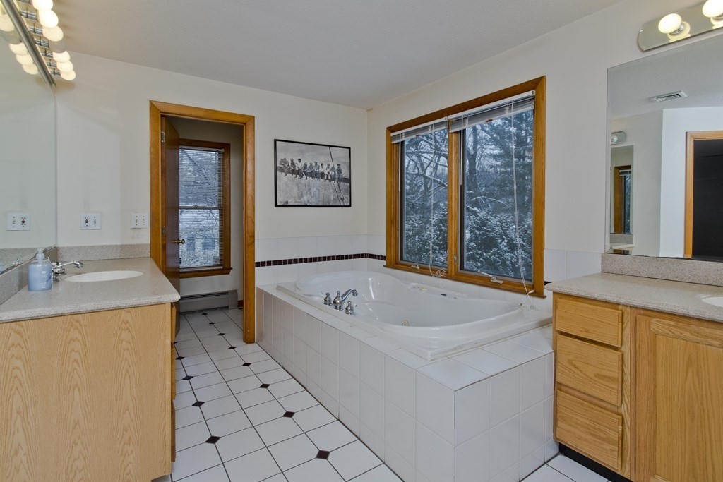 128 Birch Road Longmeadow, MA 01106 - Photo 21 of 39 a bath tub sitting next to a bathroom sink