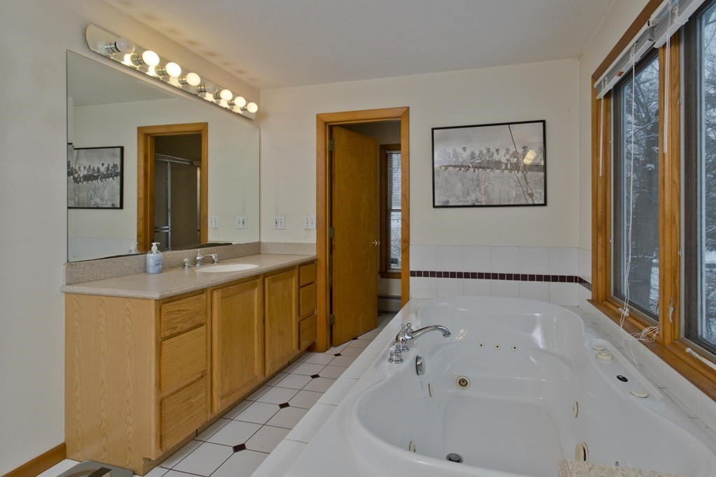 128 Birch Road Longmeadow, MA 01106 - Photo 23 of 39 a bathroom with a bathtub and a sink
