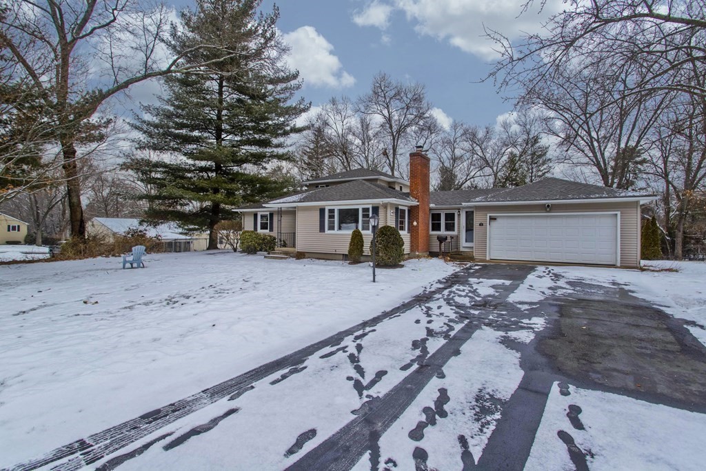 128 Birch Road Longmeadow, MA 01106 - Photo 3 of 39 a view of a house with a snow on the road
