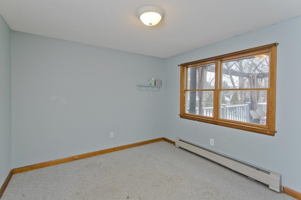 128 Birch Road Longmeadow, MA 01106 - Photo 32 of 39 a view of an empty room with a window
