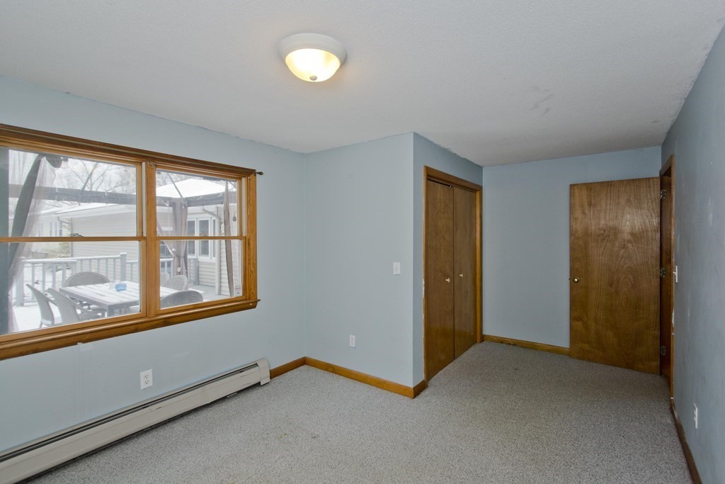 128 Birch Road Longmeadow, MA 01106 - Photo 33 of 39 an empty room with windows