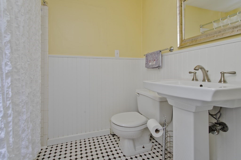 128 Birch Road Longmeadow, MA 01106 - Photo 37 of 39 a bathroom with a sink toilet and vanity