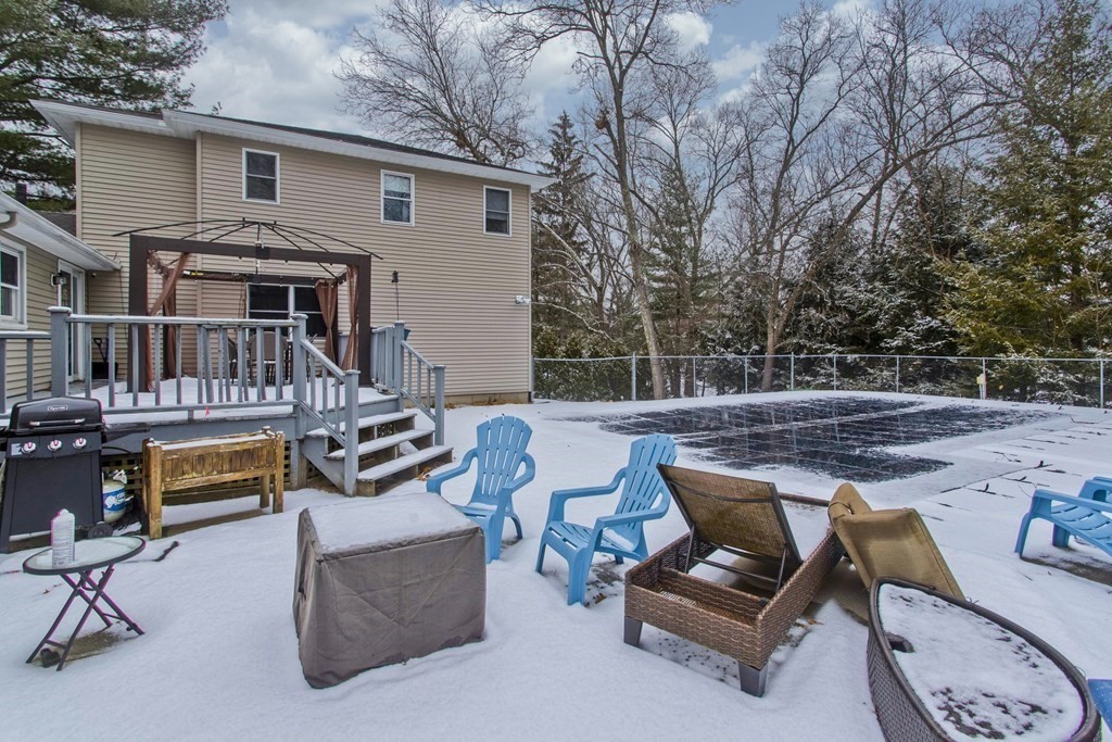 128 Birch Road Longmeadow, MA 01106 - Photo 4 of 39 a view of a patio with a table and chairs