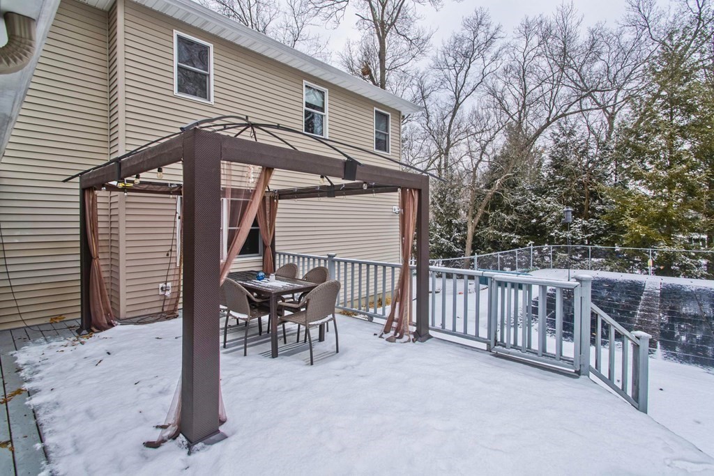 128 Birch Road Longmeadow, MA 01106 - Photo 6 of 39 a view of a patio with a table and chairs
