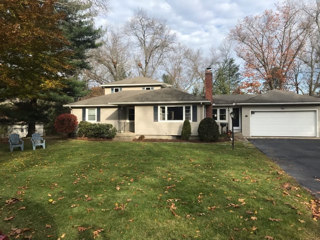 128 Birch Road Longmeadow, MA 01106 - Photo 8 of 39 a front view of a house with a garden