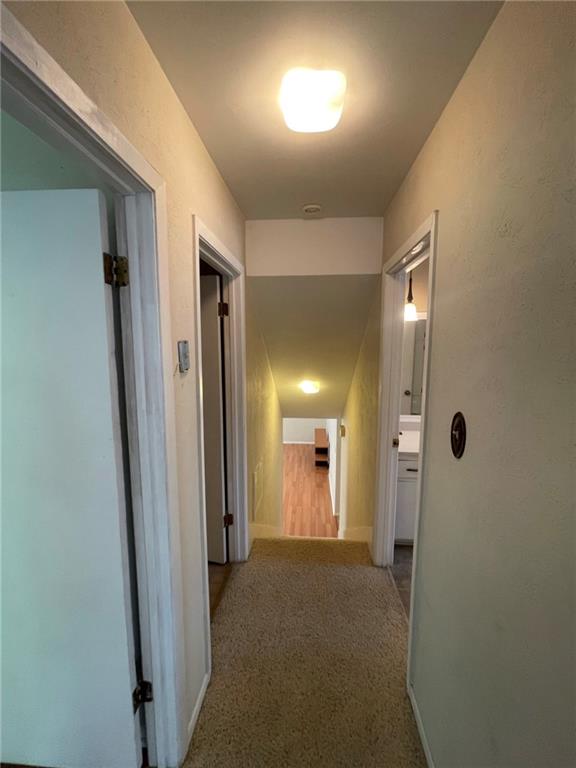 Undisclosed Address Austin, TX 78758 - Photo 11 of 21 a view of hallway with a mirror