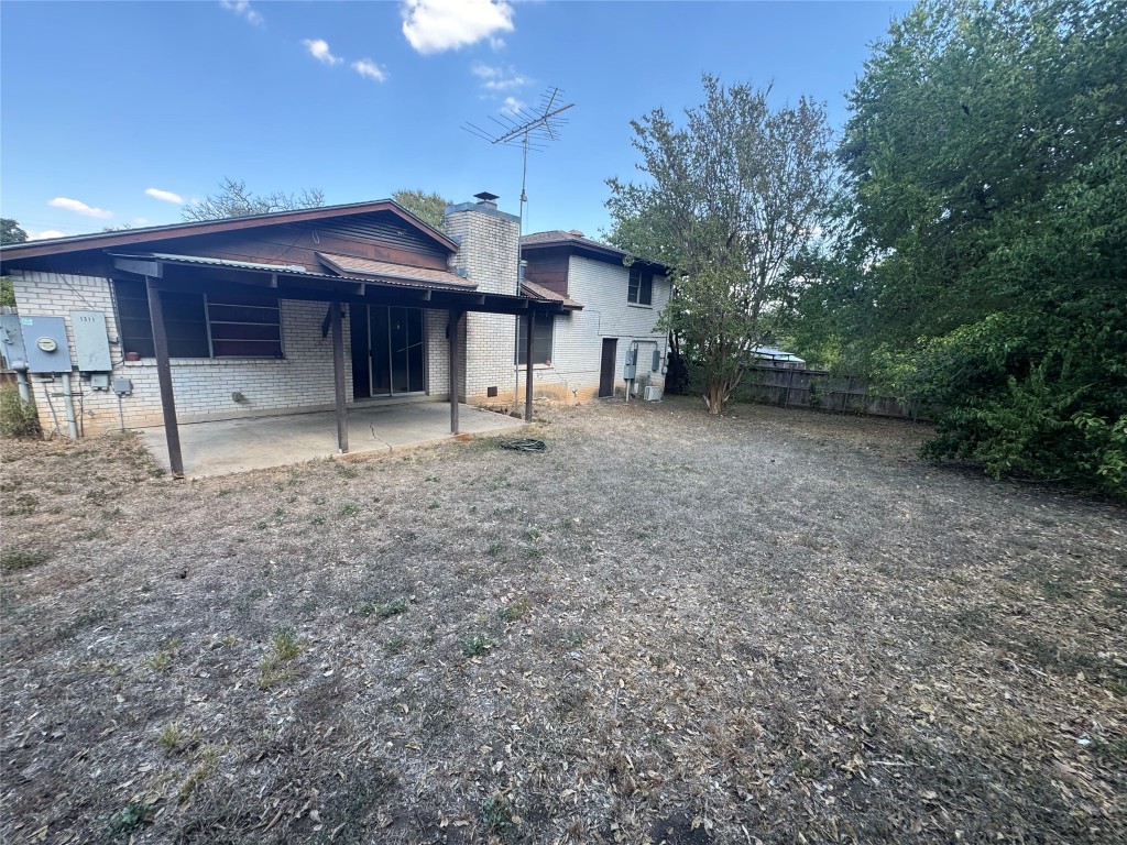 Undisclosed Address Austin, TX 78758 - Photo 20 of 21 a view of a house with a backyard and balcony