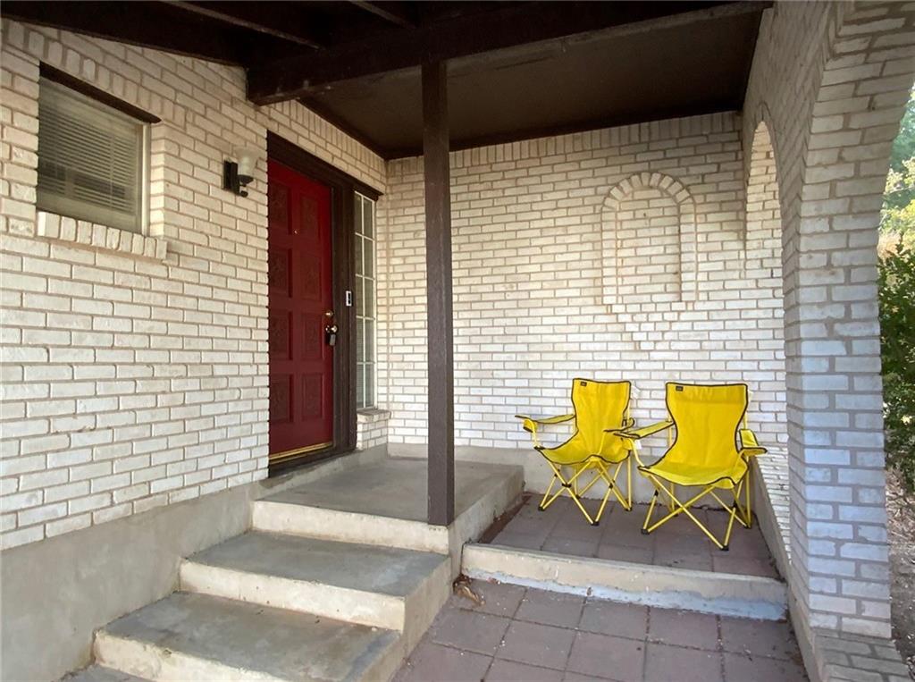 Undisclosed Address Austin, TX 78758 - Photo 2 of 21 a view of a door with wooden bench