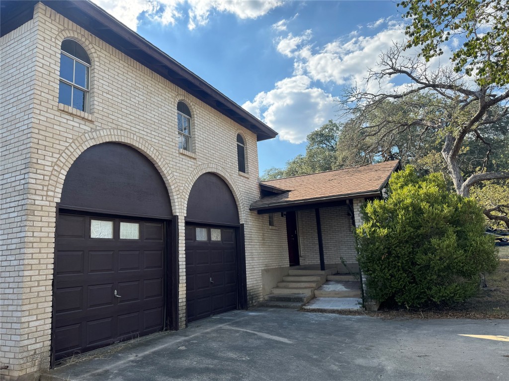Undisclosed Address Austin, TX 78758 - Photo 21 of 21 a front view of a house with a yard