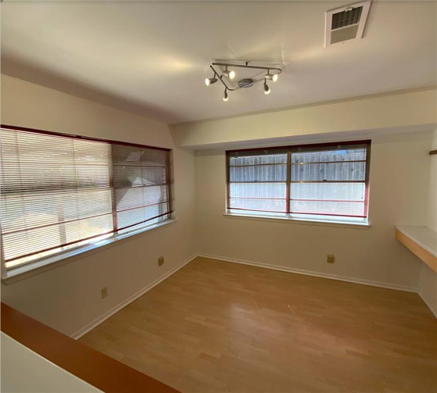 Undisclosed Address Austin, TX 78758 - Photo 7 of 21 a view of an empty room with a window