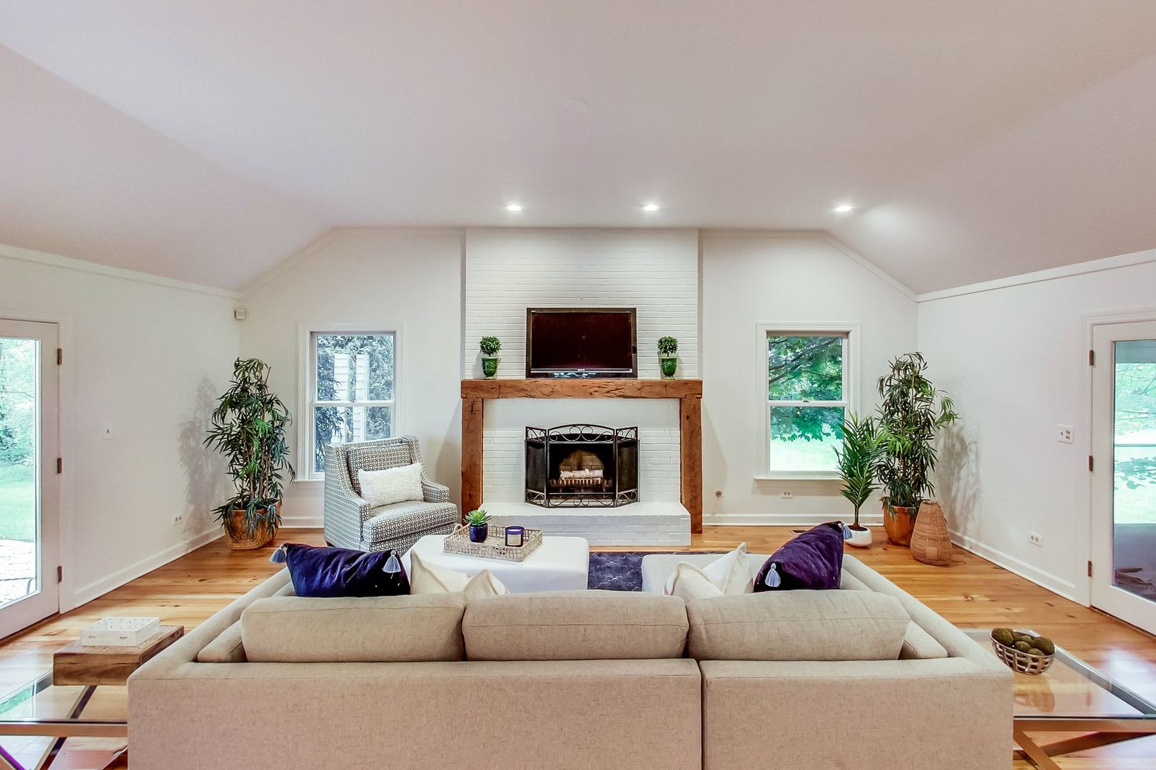 2131 Middlefork Road Northfield, IL 60093 - Photo 5 of 34 a living room with furniture and a fireplace