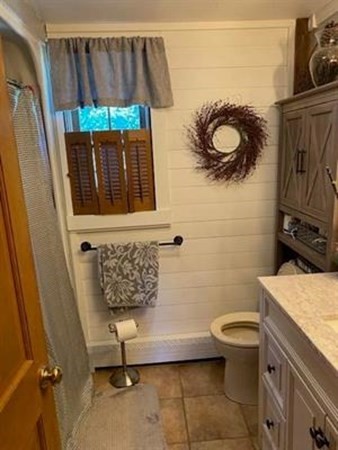 47 South Road Londonderry, NH 03053 - Photo 21 of 39 a bathroom with a granite countertop sink and a mirror