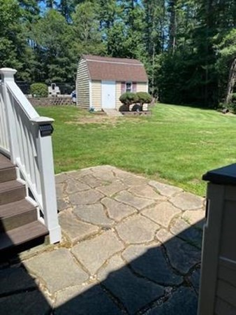 47 South Road Londonderry, NH 03053 - Photo 8 of 39 a view of a patio with a yard