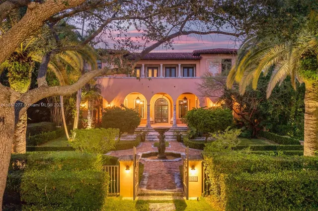 a view of a building with a garden