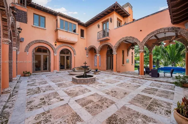 a view of a swimming pool with a garden